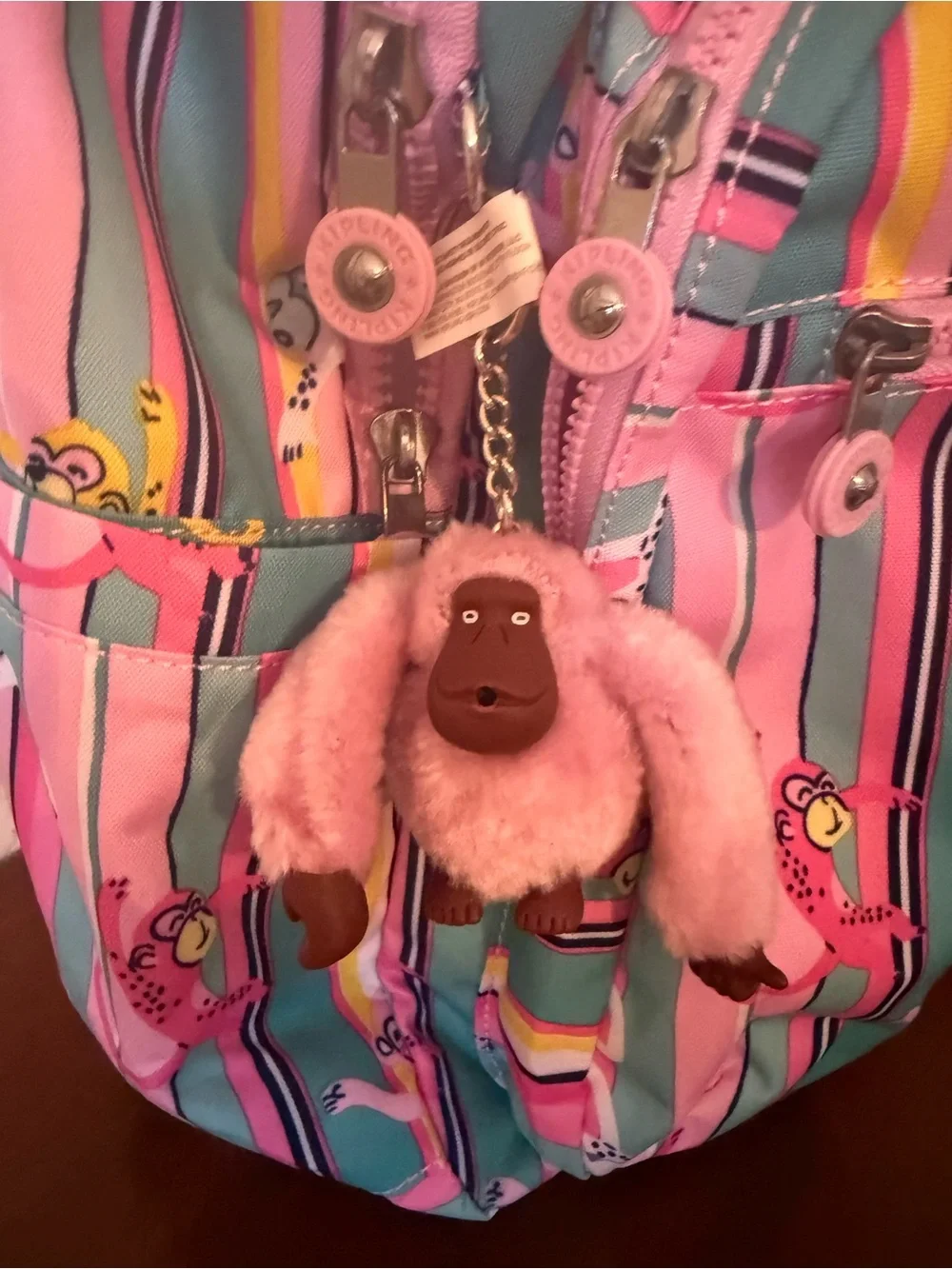 Kipling Pink Teal Multi-Color Striped Monkey Backpack